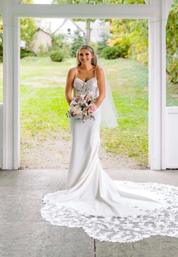 Lace top and clean bottom wedding dress, with lace chapel train.