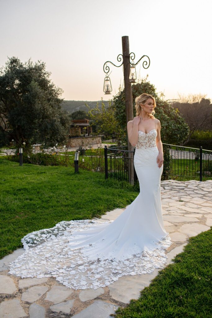 Lace top and clean bottom wedding dress, with lace chapel train.